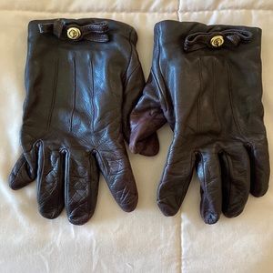 Maroon colored Coach gloves